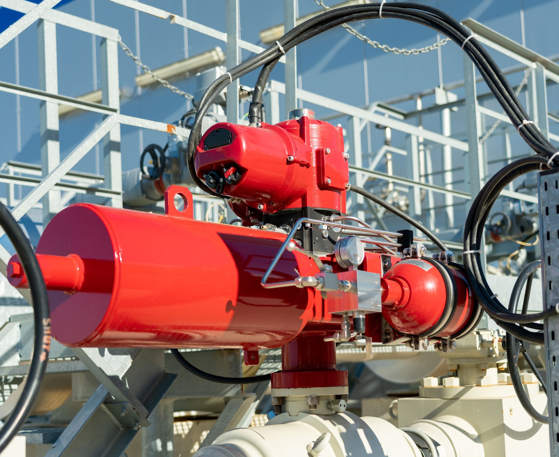 Emergency valve on gas equipment with a red actuator